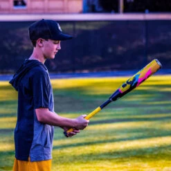 2022 DeMarini Zoa Glitch (-8) USSSA Baseball Bat: WBD2356010 -Baseball Gear Store ZoaGlitch Lifestyle 3.jpg.cq5dam.web .1200.1200